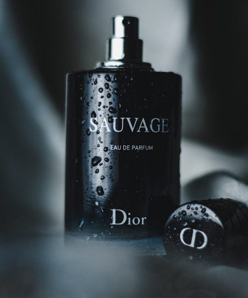 a bottle of dior sauvage on a table